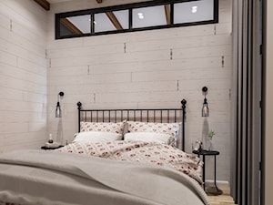 Sypialnia na poddaszu w domu jednorodzinnym - zdjęcie od Art & Deco Design