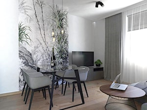 projekt mieszkania - Średnia biała szara jadalnia w salonie, styl nowoczesny - zdjęcie od BRight Studio
