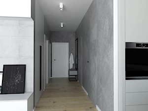 projekt mieszkania Czarodziejska - Średni z wieszakiem biały hol / przedpokój, styl nowoczesny - zdjęcie od BRight Studio