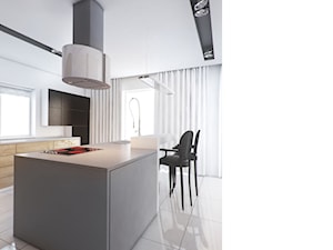 Projekt wnętrza kuchni w domu jednorodzinnym - Średnia otwarta z kamiennym blatem biała z zabudowaną lodówką z podblatowym zlewozmywakiem kuchnia dwurzędowa z wyspą lub półwyspem z oknem, styl nowoczesny - zdjęcie od archi group