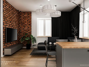 Nowoczesne mieszkanie z ceglaną ścianą - Średni szary salon z kuchnią z jadalnią, styl nowoczesny - zdjęcie od Pracownia Projektowa Wojciech Zieliński