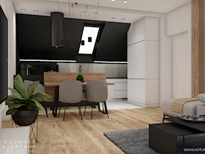 Mieszkanie w stylu nowoczesnym na poddaszu - Średnia otwarta z salonem biała czarna z zabudowaną lodówką kuchnia w kształcie litery g z oknem, styl nowoczesny - zdjęcie od Pracownia Projektowa Wojciech Zieliński