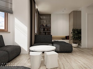 Wnętrze domu jednorodzinnego w stylu nowoczesnym - Średni biały salon z bibiloteczką, styl nowoczesny - zdjęcie od Pracownia Projektowa Wojciech Zieliński