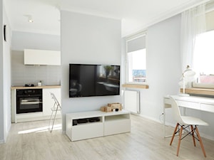 Biały salon z kuchnią z jadalnią, styl skandynawski - zdjęcie od Martyna Midel projekty wnętrz
