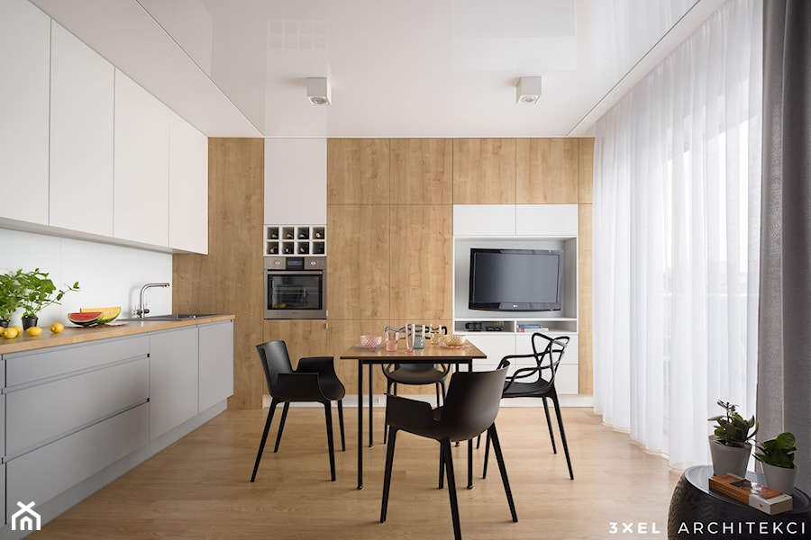 MIESZKANIE - Biały salon z kuchnią z jadalnią z tarasem / balkonem, styl nowoczesny - zdjęcie od 3XEL Architekci