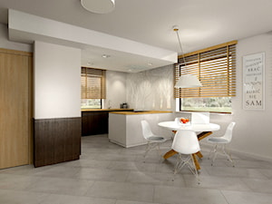 projekt otwartej kuchni i wiatrołap Gniezno - Średnia otwarta z salonem szara z zabudowaną lodówką kuchnia w kształcie litery g z oknem, styl nowoczesny - zdjęcie od FLUO design