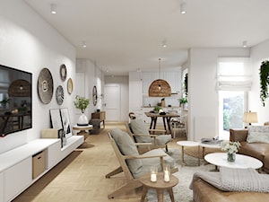 Mieszkanie w Warszawie - Duży biały salon z kuchnią z jadalnią z bibiloteczką - zdjęcie od UNIQUE INTERIOR DESIGN