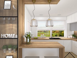 Kuchnia z witryną - Średnia otwarta z salonem biała z zabudowaną lodówką z nablatowym zlewozmywakiem kuchnia w kształcie litery l dwurzędowa z oknem, styl nowoczesny - zdjęcie od KRU design