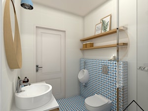 Niebieska łazienka przy sypialni głównej