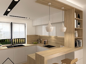 Kuchnia w bieli i drewnie - Średnia otwarta biała z zabudowaną lodówką z nablatowym zlewozmywakiem ... - zdjęcie od KRU design