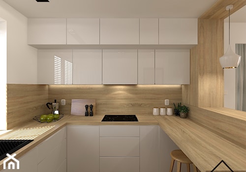Kuchnia w bieli i drewnie - Średnia otwarta biała z zabudowaną lodówką z nablatowym zlewozmywakiem kuchnia w kształcie litery u z oknem, styl nowoczesny - zdjęcie od KRU design
