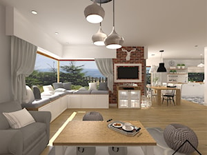 Salon z cegłą na ścianie - Duży biały szary salon z kuchnią z jadalnią, styl skandynawski - zdjęcie od KRU design