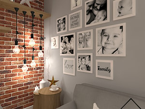 Salon z cegłą na ścianie - Szary salon, styl skandynawski - zdjęcie od KRU design
