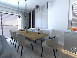 Apartament na Nowym Mokotowie - Średnia biała czarna szara jadalnia w salonie, styl nowoczesny - zdjęcie od CZYSTA FORMA