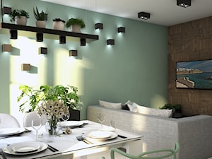 Apartament na osiedlu Wola Libre w Warszawie - Mały szary zielony salon z jadalnią - zdjęcie od CZYSTA FORMA