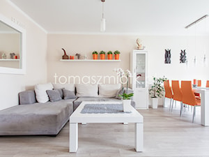 Fotografia nieruchomości - Średni pomarańczowy salon z jadalnią, styl nowoczesny - zdjęcie od Tomasz M