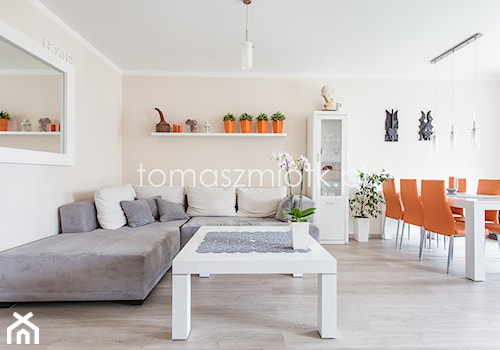 Fotografia nieruchomości - Średni pomarańczowy salon z jadalnią, styl nowoczesny - zdjęcie od Tomasz M