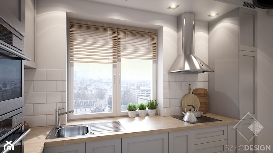 Projekt mieszkania w Płocku - Średnia biała z zabudowaną lodówką z podblatowym zlewozmywakiem kuchnia w kształcie litery l z oknem, styl skandynawski - zdjęcie od Szkic Design - Projektowanie wnętrz