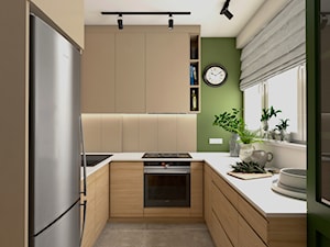 Mieszkanie w bloku - Średnia otwarta beżowa biała zielona z zabudowaną lodówką z nablatowym zlewozmywakiem kuchnia w kształcie litery u z oknem, styl nowoczesny - zdjęcie od Beata Szczudrawa projektowanie wnętrz
