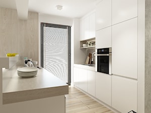 Projekt mieszkania 5 - Średnia otwarta biała z zabudowaną lodówką z podblatowym zlewozmywakiem kuchnia dwurzędowa z oknem, styl nowoczesny - zdjęcie od BAGUA Pracownia Architektury Wnętrz