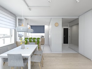 (Pruszków) Projekt mieszkania 3 - Średnia biała jadalnia w salonie, styl nowoczesny - zdjęcie od BAGUA Pracownia Architektury Wnętrz