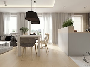 (Łódź) Projekt mieszkania 4 - Średnia biała jadalnia w salonie w kuchni, styl nowoczesny - zdjęcie od BAGUA Pracownia Architektury Wnętrz
