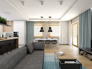 (Sochaczew) Projekt domu jednorodzinnego 8 - Średni biały szary salon z kuchnią z jadalnią, styl skandynawski - zdjęcie od BAGUA Pracownia Architektury Wnętrz
