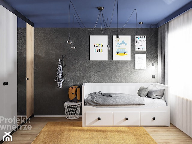 Mały pokój dziecka pokój dla chłopca nastolatka styl nowoczesny z szafą z biurki