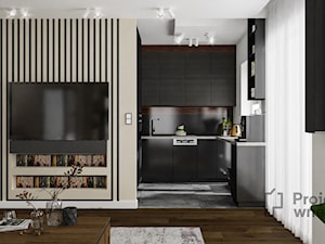 Mały salon z kuchnią jadalnią nowoczesny loft industrialny ciemne drewno czarny lamele PROJEKT: WNĘTRZE www.projektwnetrze.com.pl - zdjęcie od PROJEKT: WNĘTRZE