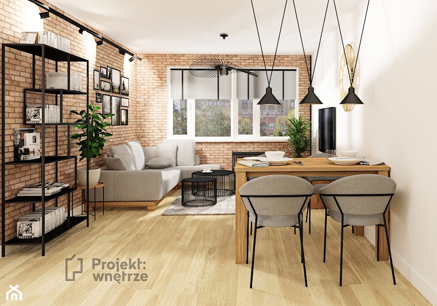 Mały szary salon z kuchnią jadalnią loft cegła czarny PROJEKT: WNĘTRZE www.projektwnetrze.com.pl - zdjęcie od PROJEKT: WNĘTRZE