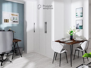Mały szary salon z kuchnią jadalnią nowoczesny z narożnikiem cegła loft beton industrialny mikro apartament PROJEKT: WNĘTRZE www.projektwnetrze.com.pl - zdjęcie od PROJEKT: WNĘTRZE
