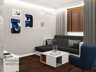 Mieszkanie - funkcjonalny minimalizm: szarość, beton, biel z dodatkiem granatu