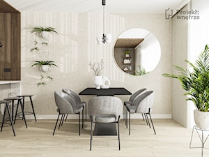 Średnia jadalnia nowoczesna w salonie z czarnym stołem prostokątnym beżowe ściany czarne beżowe krzesła podłoga jasne drewno PROJEKT: WNĘTRZE - zdjęcie od PROJEKT: WNĘTRZE