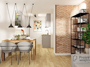 Mały szary salon z kuchnią jadalnią loft cegła czarny PROJEKT: WNĘTRZE www.projektwnetrze.com.pl - zdjęcie od PROJEKT: WNĘTRZE