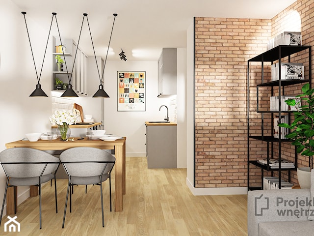 Mikro apartament mały salon z kuchnią jadalnią loft cegła szary