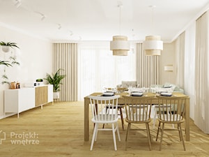 Duża jadalnia nowoczesna w salonie boho z dużym prostokątnym stołem drewnianym białe ściany tapeta podłoga drewno drewno PROJEKT: WNĘTRZE www.projektwnetrze.com.pl - zdjęcie od PROJEKT: WNĘTRZE