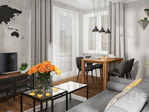 Mały salon z kuchnią jadalnią nowoczesny szary minimalistyczny beton loft ciemne drewno niebieski PROJEKT: WNĘTRZE www.projektwnetrze.com.pl - zdjęcie od PROJEKT: WNĘTRZE