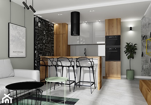 Męskie mieszkanie - Mała otwarta biała czarna zielona z zabudowaną lodówką kuchnia dwurzędowa z wyspą lub półwyspem, styl industrialny - zdjęcie od LuArt Design