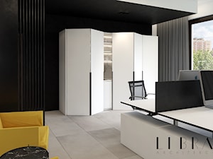 Projekt wnętrza biura - Średnie z sofą z zabudowanym biurkiem czarne szare biuro, styl nowoczesny - zdjęcie od LIBRA Architekci