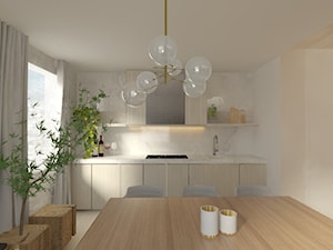 średnia kuchnia z jadalnią w drewnianymi frontami i marmurem na ścianie - zdjęcie od Atelier 37 | architektura & projektowanie wnętrz