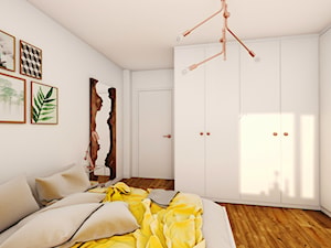 Słoneczna sypialnia z żółcią drewnem i miedzią. - zdjęcie od Jachtoma design