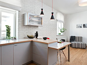 Apartament na wynajem, Poznań 2 - Mała biała jadalnia w salonie, styl nowoczesny - zdjęcie od BRZUSKArchitekt - Alicja Brzuska