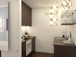 Małe mieszkanie m5/ Janasa 9 - Średnia otwarta z kamiennym blatem biała z zabudowaną lodówką z nablatowym zlewozmywakiem kuchnia dwurzędowa - zdjęcie od Keokeo