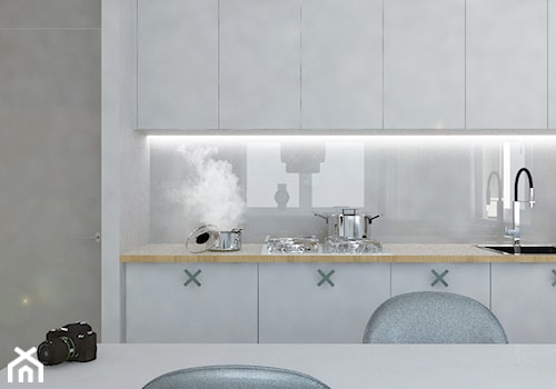 Kawalerka Będzin - Średnia zamknięta biała z zabudowaną lodówką z nablatowym zlewozmywakiem kuchnia w kształcie litery l, styl skandynawski - zdjęcie od Keokeo