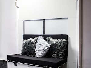 Łóżko chowane z funkcjonalnymi frontami - zdjęcie od niewidzialnemeble