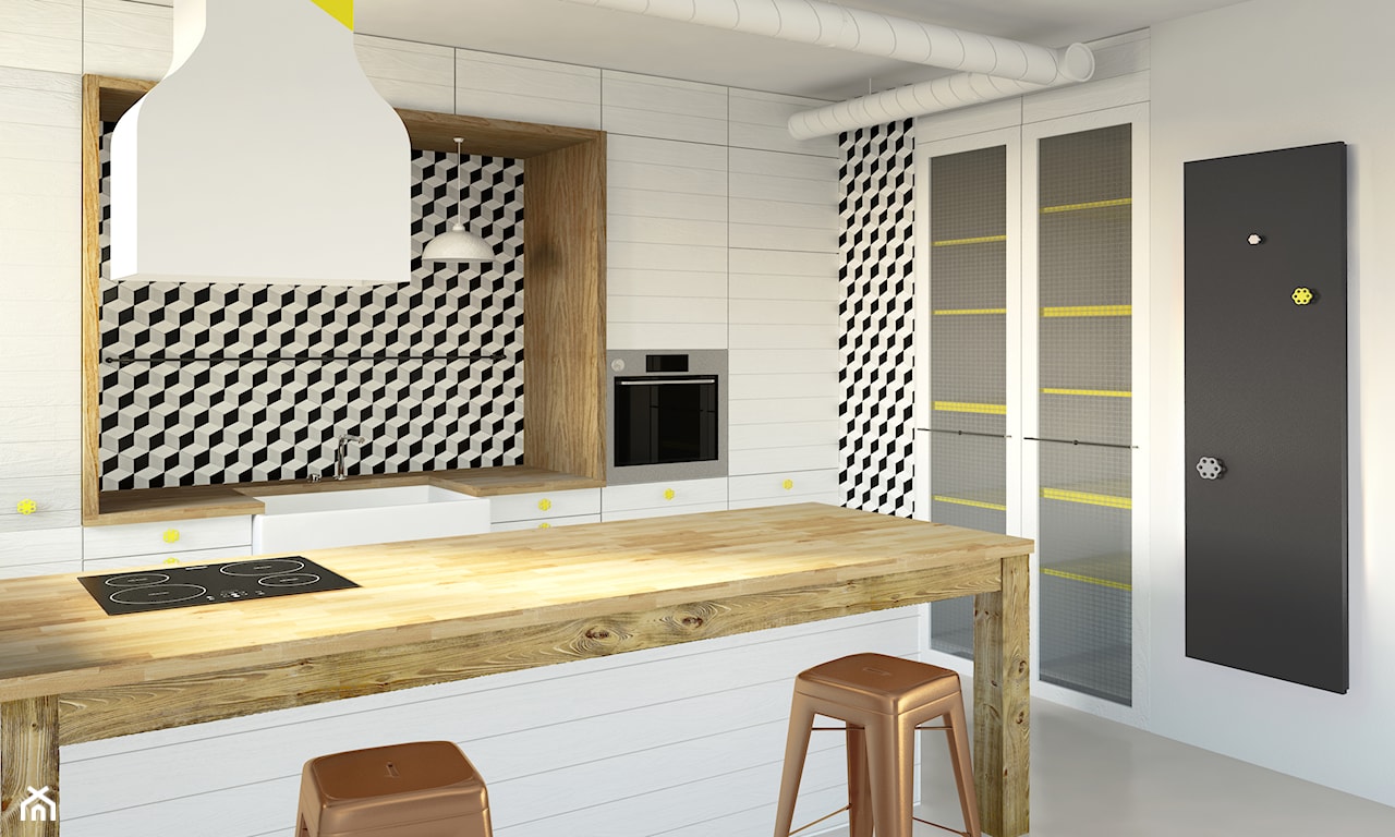 czarny grzejnik Instal Projekt, biała kuchnia, miedziane hokery, drewniany blat w kuchni