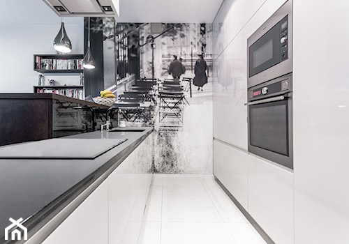 Mieszkanie na Wilanowie - Średnia otwarta z salonem z kamiennym blatem biała z zabudowaną lodówką z podblatowym zlewozmywakiem kuchnia dwurzędowa, styl nowoczesny - zdjęcie od Iv Design