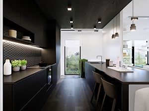 Apartament Subtrakt - Duża otwarta z salonem biała czarna z zabudowaną lodówką z podblatowym zlewozmywakiem kuchnia dwurzędowa z oknem, styl minimalistyczny - zdjęcie od KANDO ARCHITECTS