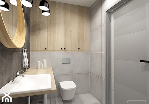 łazienka w betonach i szarościach - Mała na poddaszu bez okna z lustrem łazienka, styl nowoczesny - zdjęcie od Strzelecka Design