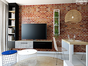 Salon w loftowym klimacie - Mały biały salon z kuchnią z jadalnią, styl nowoczesny - zdjęcie od Strzelecka Design